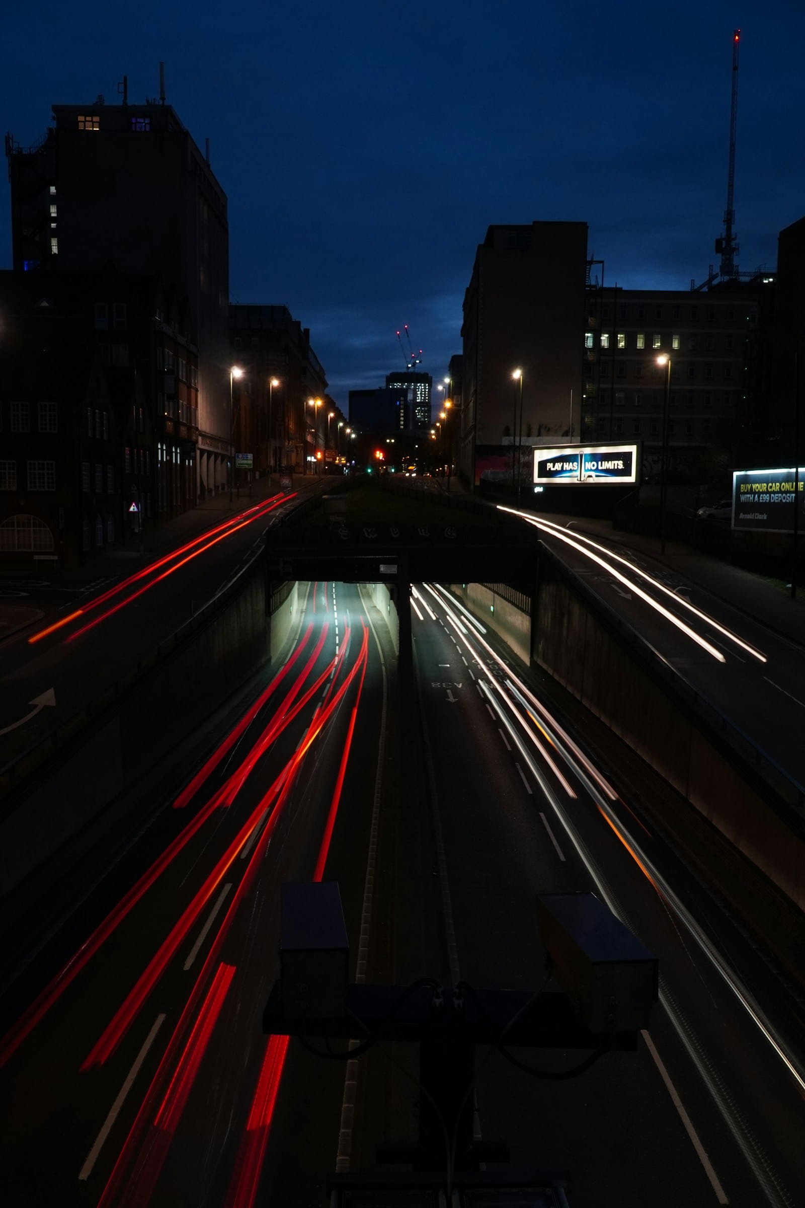 Light trails from traffic in a city at night